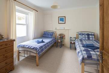 The twin bedroom has plenty of space to spread out and make yourself at home.