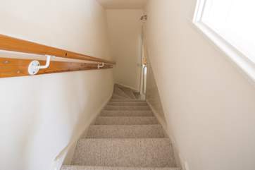 Stairs leading up to the second floor snug/games-room.