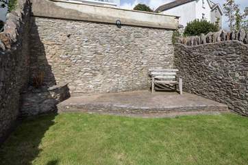 Why not sneak off with a good book and sit back and relax in the property's raised garden-area.