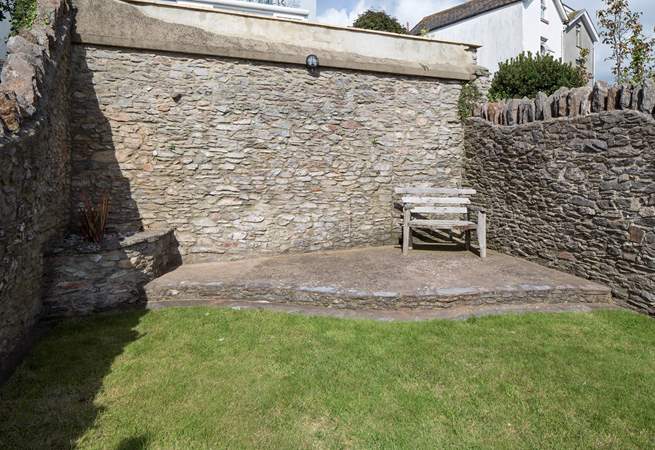 Why not sneak off with a good book and sit back and relax in the property's raised garden-area.
