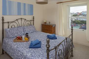 Bedroom 1 with a king-size bed treats you to some great views to wake up to.