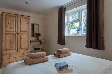Spacious, comfortable and with views over the owners' garden to the rear.