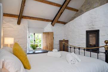 Bespoke shutters, exposed walls and slate sills all add to the character.