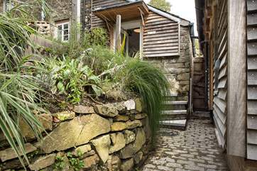 The steps lead down to the sunken terrace - please take care with children on the steps.