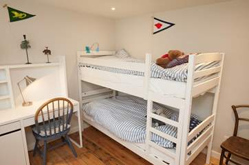 The bunk bedroom is adorable and great for the younger ones in your party.