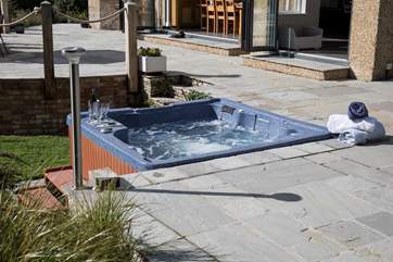 For a little holiday indulgence, turn on the jets and sink into the hot tub for some hydrotherapy and maybe a glass of wine.