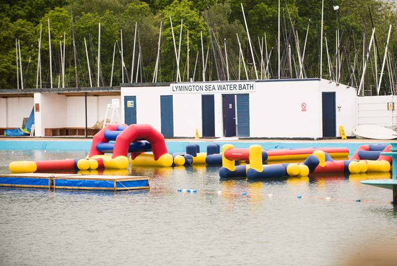 Have an energetic day on the inflatable obstacle course at the Salt Water Baths in nearby Lymington.
