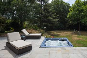 The south-facing terrace catches the sun all day long, who needs to go out exploring, maybe a lazy day beside the hot tub?