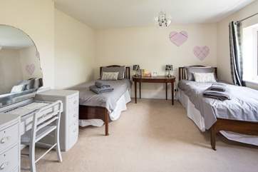 At the back of the house and down its own private corridor, bedroom 5 has 3ft twin beds, with the en suite shower-room just across the corridor.