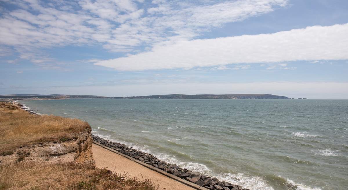 Looking east towards the Isle of Wight and the Needles, dogs are allowed on the beach all year.