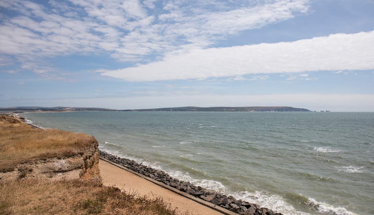 Looking east towards the Isle of Wight and the Needles, dogs are allowed on the beach all year.