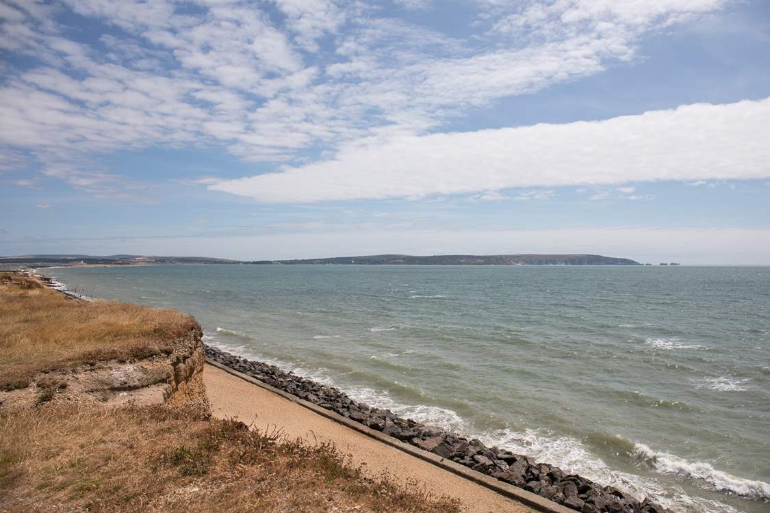 Looking east towards the Isle of Wight and the Needles, dogs are allowed on the beach all year.
