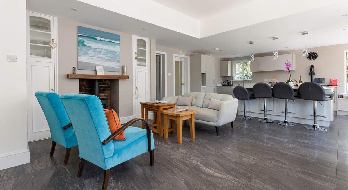 The modern kitchen has an Aga and a wood-burner; these are switched off during the summer months as the room becomes uncomfortably hot.