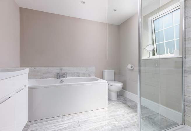 The en suite has a large shower cubicle with drench head.