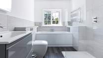 The spacious family bathroom.