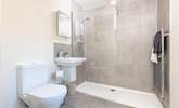 This large walk-in shower is on the ground floor, ideal for sandy children after a day at the beach. - Thumbnail Image