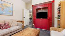 The playroom has TV, DVD player, books, games and an Xbox 360 to keep all the family entertained.
