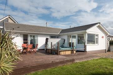 Ocean Breeze is a single-storey property with an enclosed garden and deck.