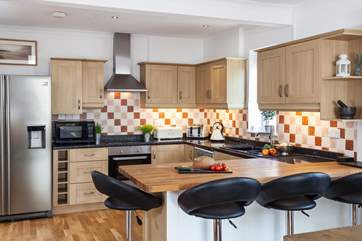 The open plan kitchen-area is bright and light.