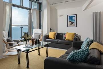 Two comfy sofas to relax in after a day out exploring (please be aware there are now no curtains to enhance the view).