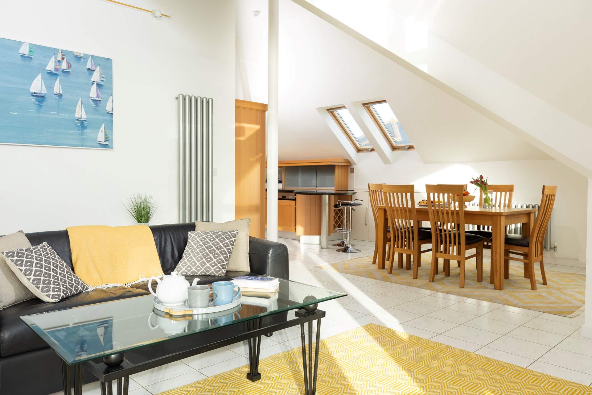 The open plan living space is so sociable and the view can be enjoyed from every aspect of the penthouse. 