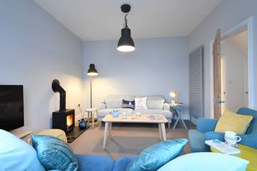 The bright contemporary sitting-room.