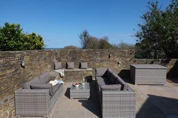 There is plenty of comfy outdoor furniture for everyone to relax.
