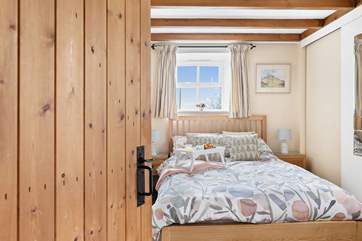 The lovely master bedroom is on the ground floor.
