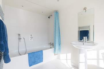 There is a spacious family bathroom.