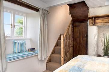 A second set of stairs lead off from bedroom 1 to the bathroom on the first floor. Please note the stairs are steep and narrow.