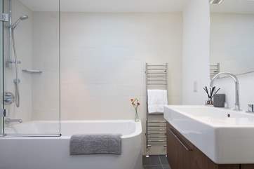 The family bathroom has cosy under-floor heating.