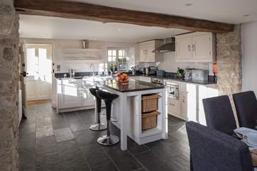 The very modern open plan kitchen/diner is great for creating holiday treats to remember; the beam is over 6ft.