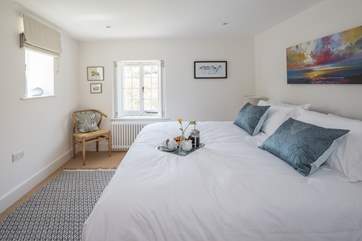 Bedroom 2 can be made up as a 6ft bed or two 3ft beds. Stylish shutters add to the contemporary decor in this cottage.