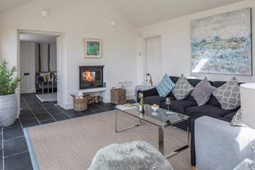 There are two living room areas, the snug and the garden room - there is a fabulous two-sided wood burning stove between the two rooms.