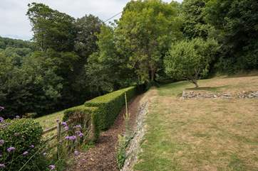 The garden faces south west and has great views across Branscombe Vale. Please supervise small children as there is a sunken fence (a ha-ha) at the side of the lawn.