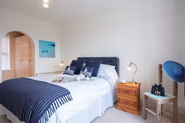 The bedroom has a 5' king-size bed.