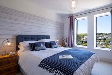 The bedroom shares the views across the valley to Heligan.