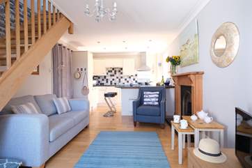 The stylish sitting-area with an open fire for cosy evenings.