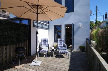 The sun loungers and barbeque are ready for your arrival.