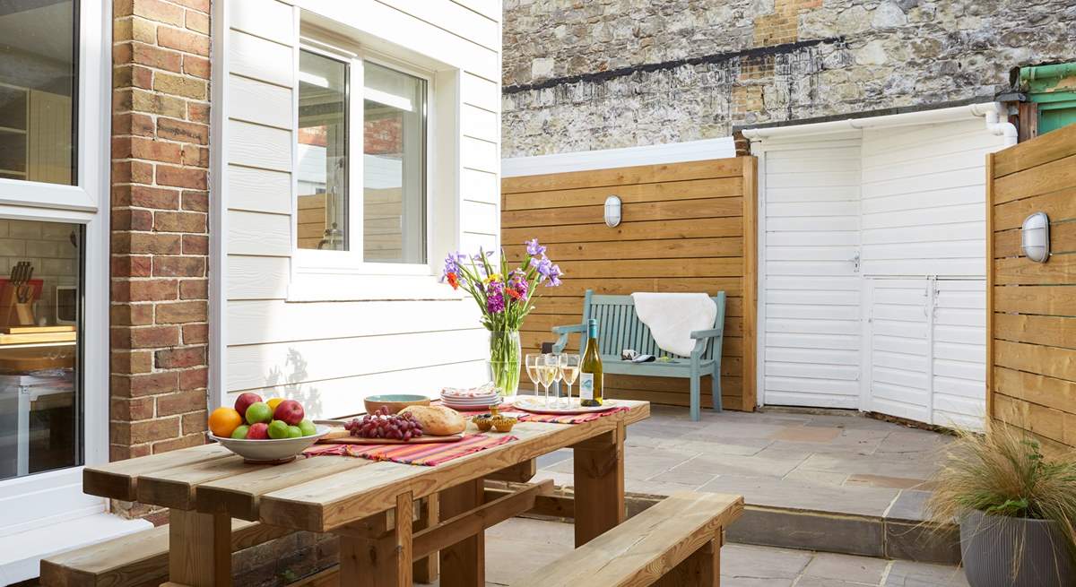 Enjoy al fresco dining on the secluded rear patio.