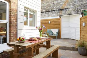 Enjoy al fresco dining on the secluded rear patio.