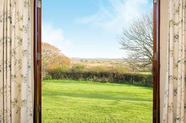 Throw open the patio doors in the master bedroom and enjoy the fabulous view.