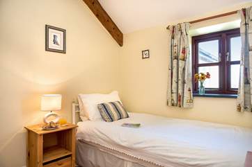 The single bedroom.