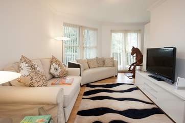 Second sitting-room on the lower ground floor, a great space for the children to play board games or watch a film.