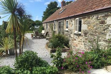 Lavender Barn with private terrace and views over the beautiful gardens and pond of the main house.