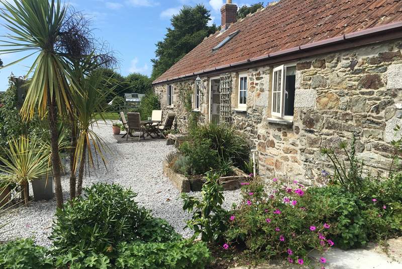 Lavender Barn with private terrace and views over the beautiful gardens and pond of the main house. 