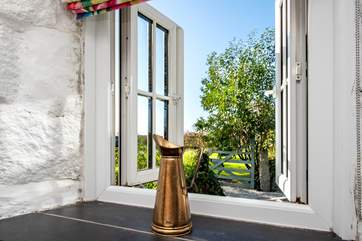 Bedroom two with beautiful views over the garden.