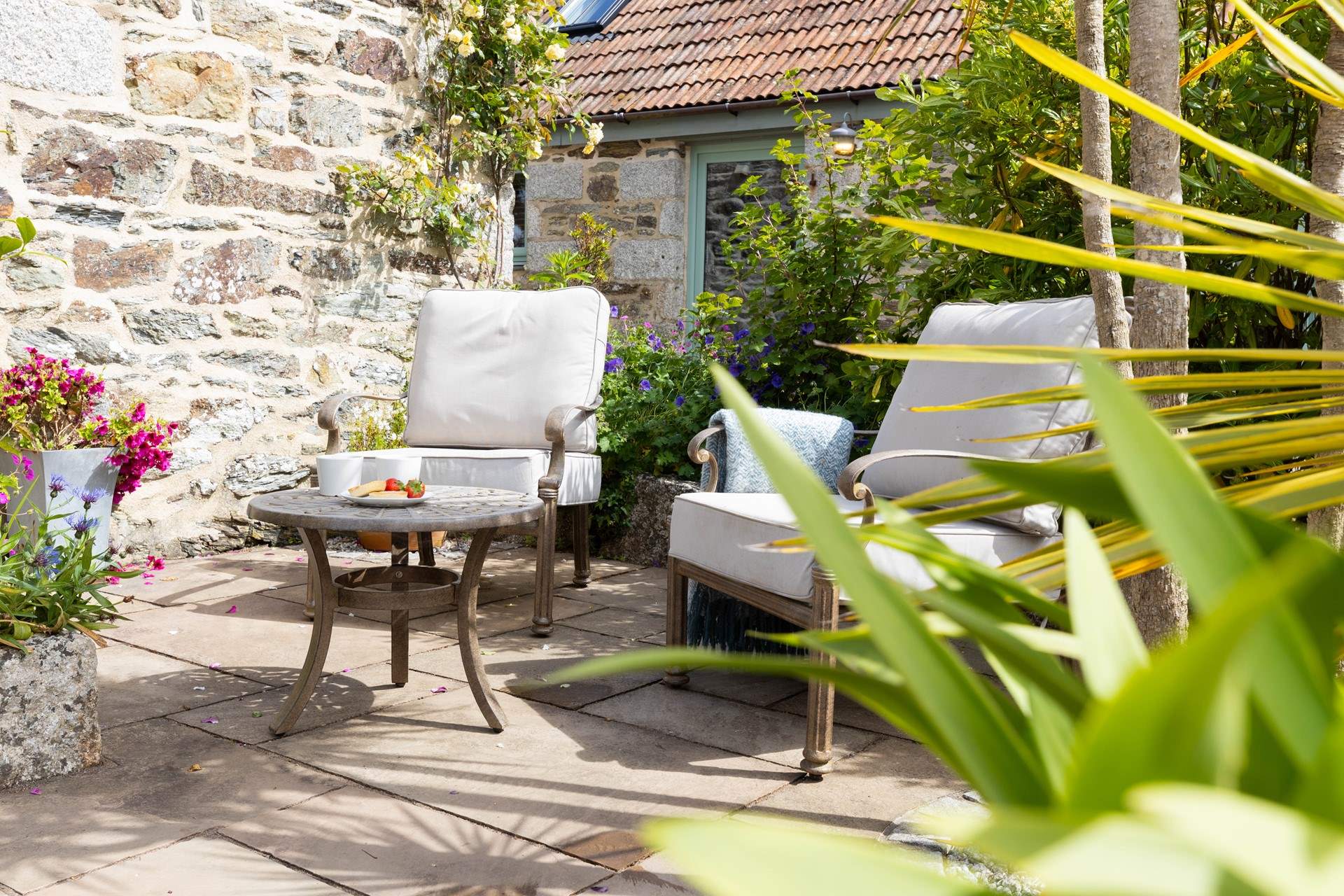 A lovely spot on the sheltered patio to sit and relax.