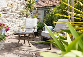  A lovely spot on the sheltered patio to sit and relax.