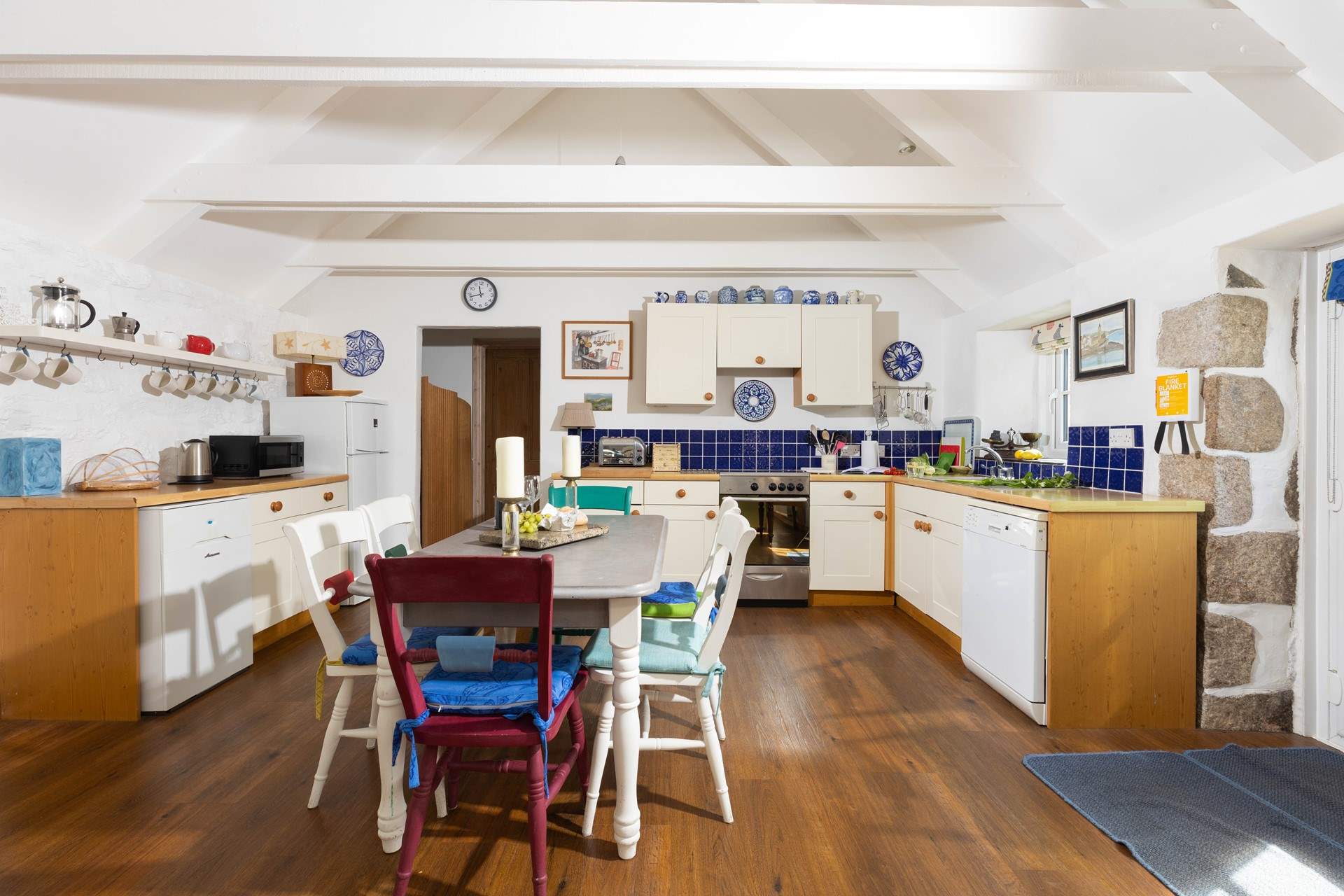 The kitchen is spacious and well-equipped. 